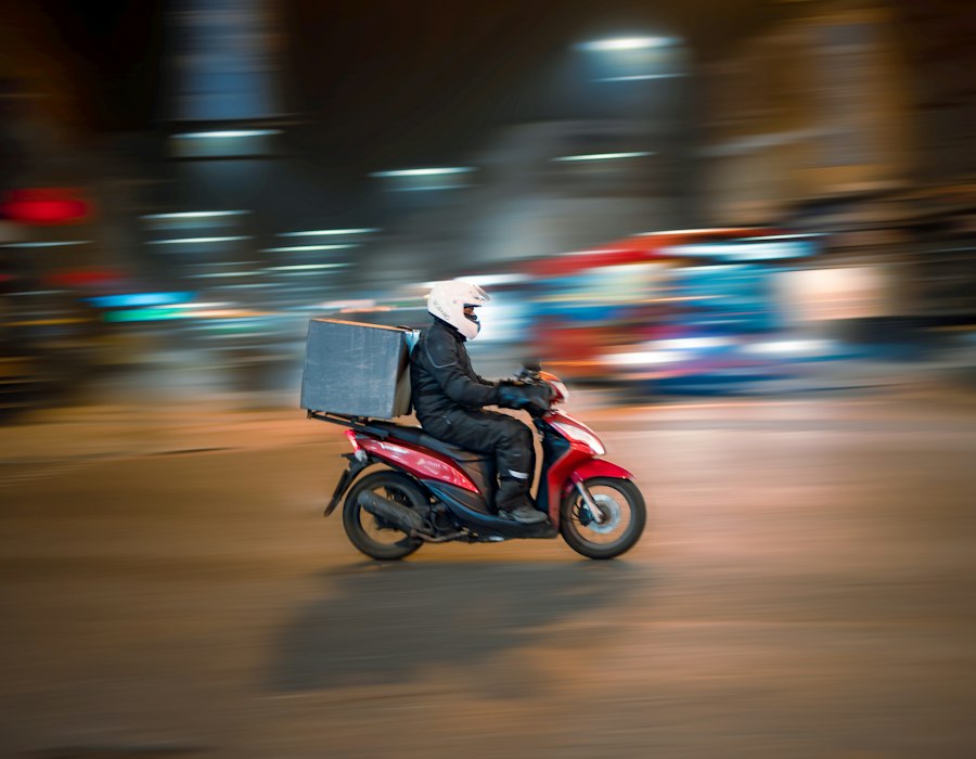 Delivery courier carrying restaurant orders